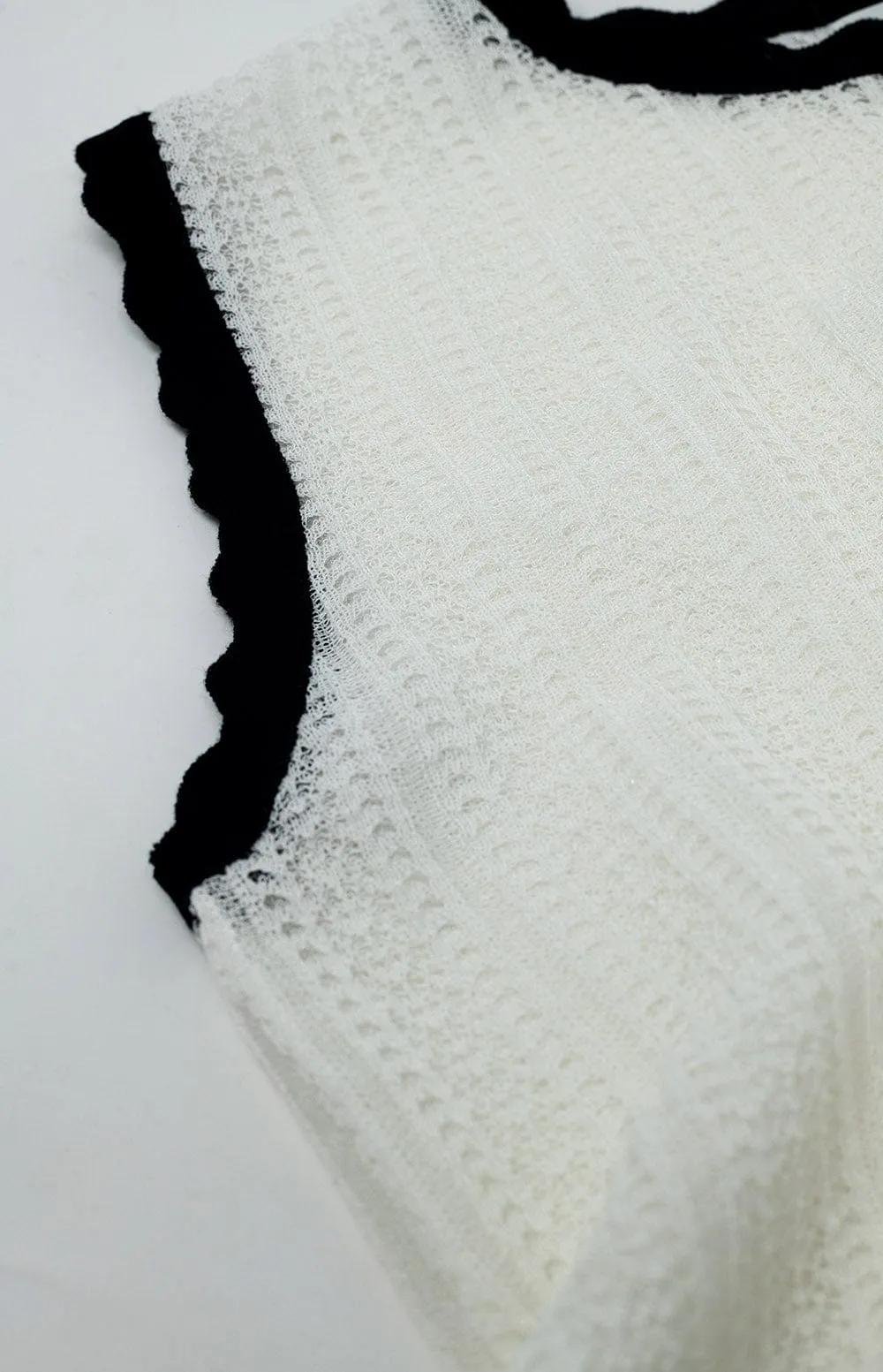 White Knitted Pointelle Top With Black Wavy Trim
